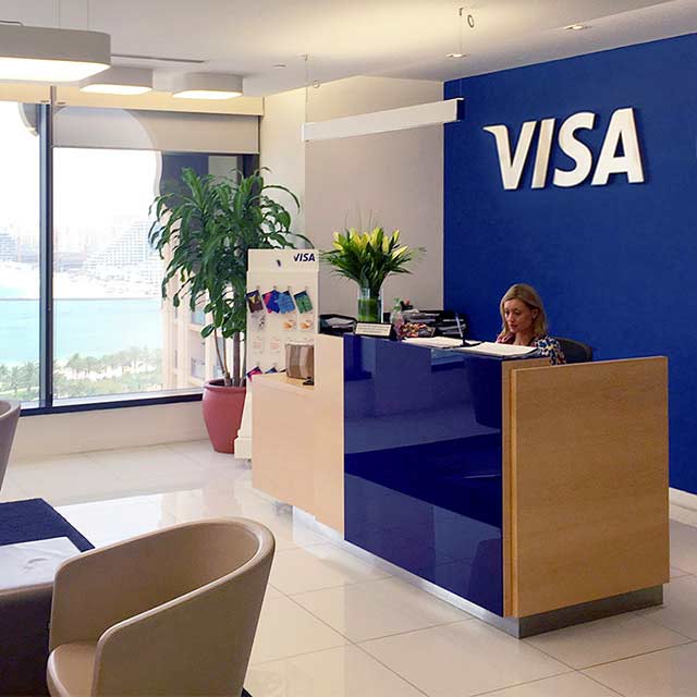 reception-dubai-innovation-center-640x640 The reception area of the Dubai Innovation Center, which includes a Visa logo on the wall.