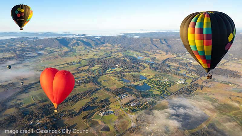 Hot air balloons flying over Pokolbin in the Hunter Valley.